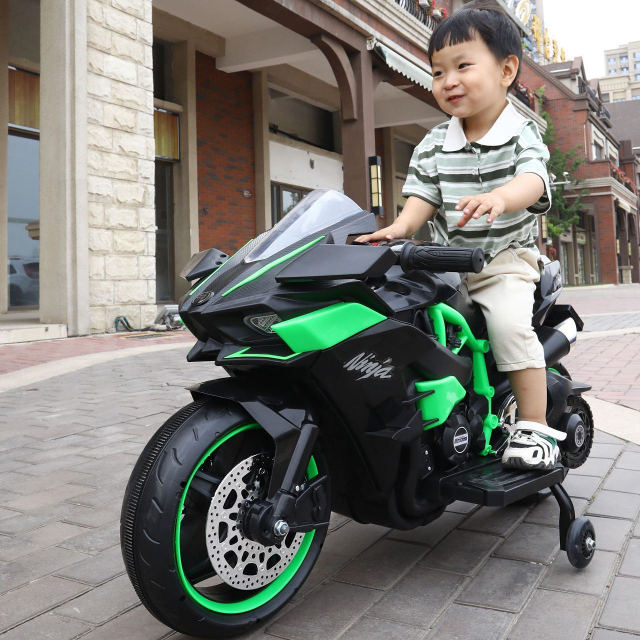 Moto électrique rechargeable à deux roues  pour enfants, jouet pour enfants de type Kawasaki Ninja H2, un modèle réduit inspiré de la célèbre moto hypersportive. Une batterie de moto à deux roues élec